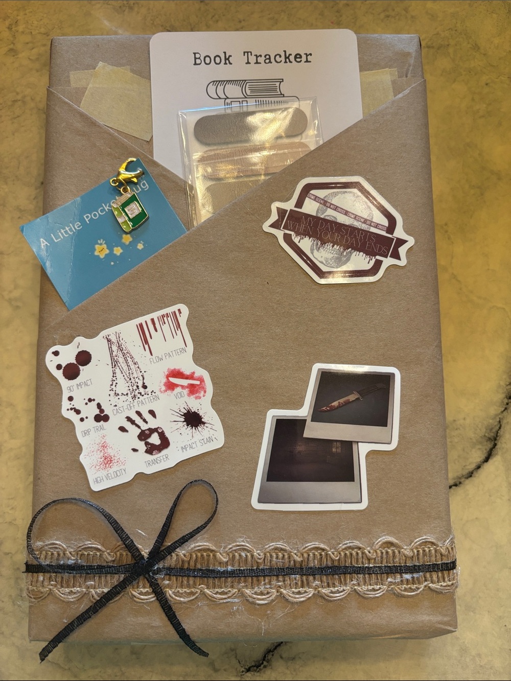 Handwrapped Kraft Gift with Vintage Sticker Accents